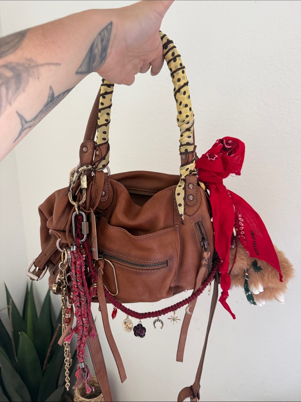 Baby Emerson bag free people WITH CHARMS and scarves.